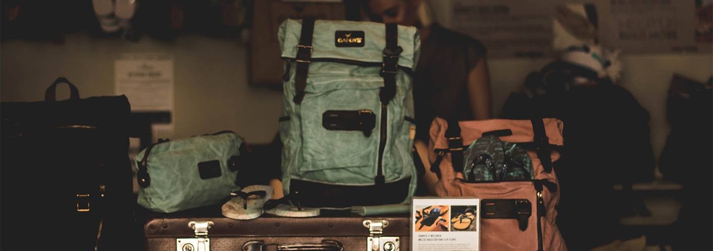 several backpacks sitting in a display